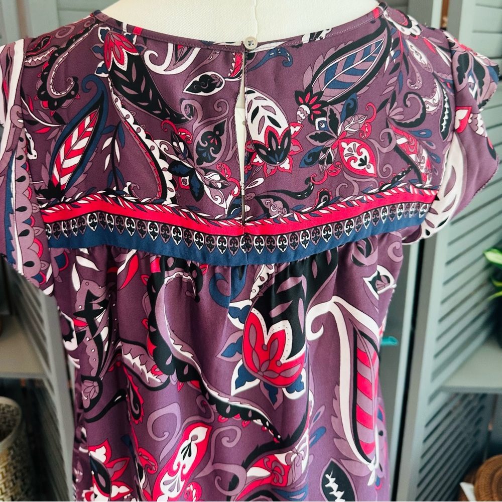 LOFT Purple Paisley Flutter Sleeve Blouse Smocked Ruffle Front and Keyhole Back. - Picture 8 of 11
